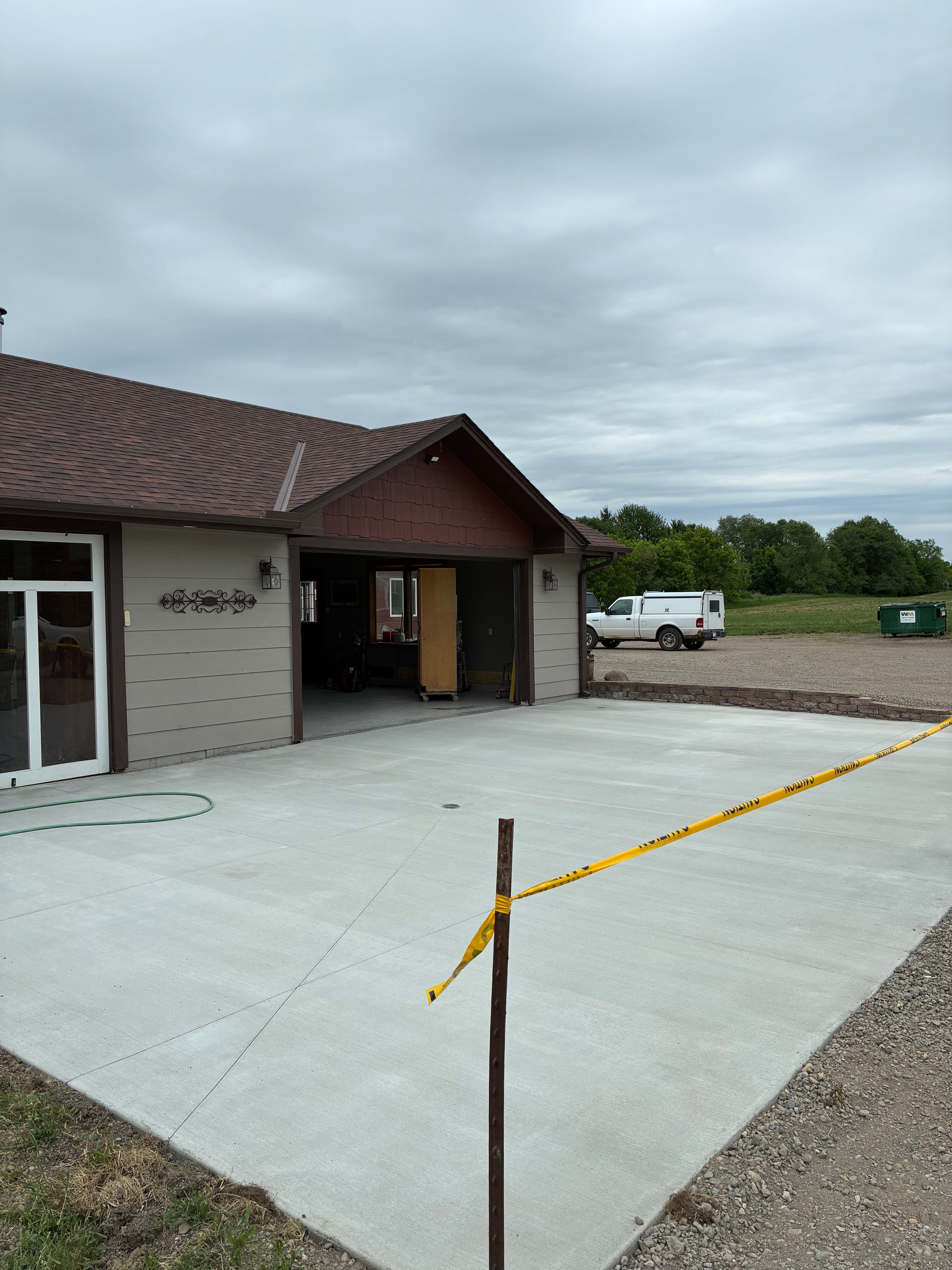 Project New Concrete Driveway and Epoxy Garage Floor Done Right image
