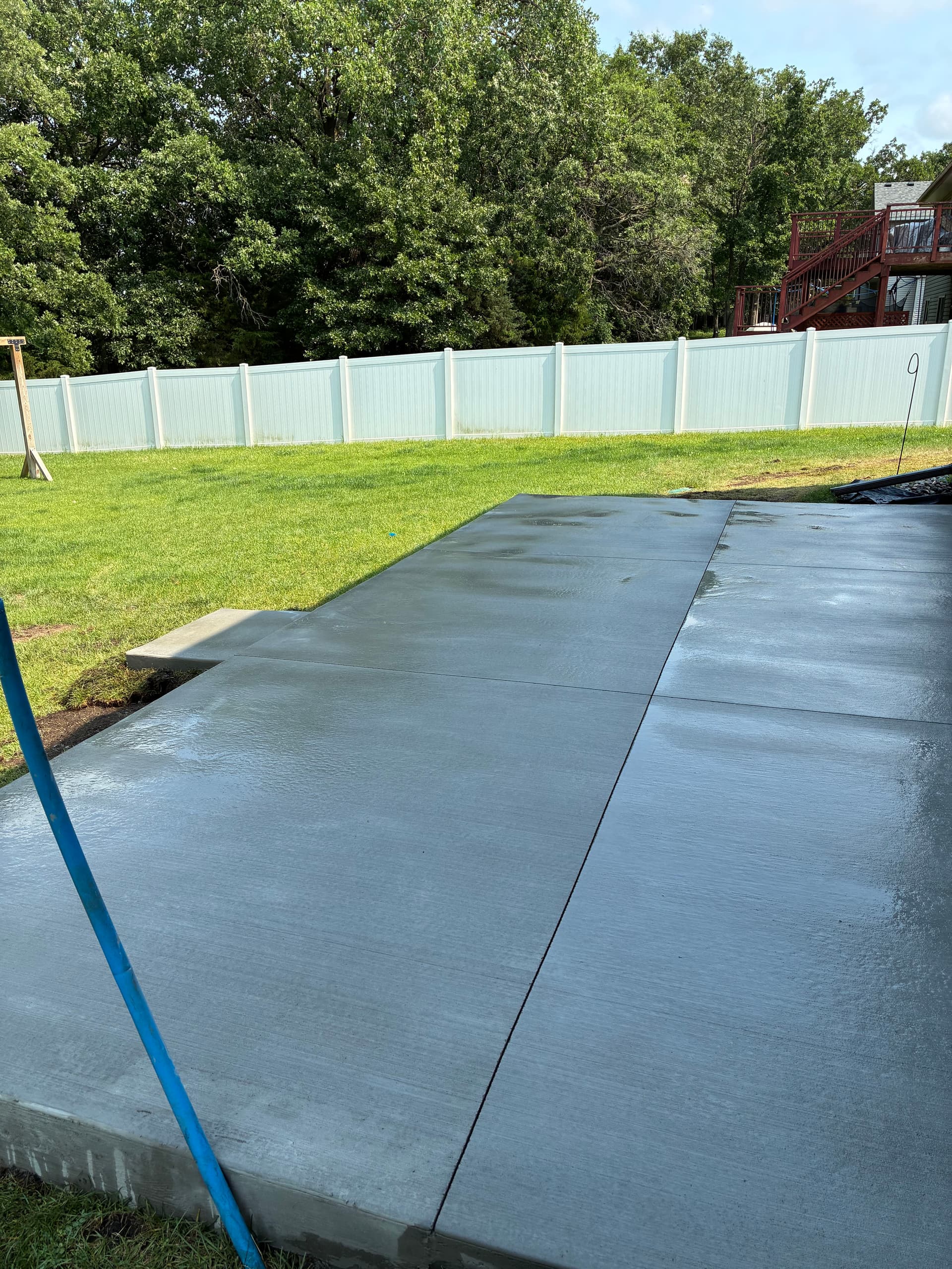 Fresh Concrete Patio Gives This Backyard a Solid Foundation image