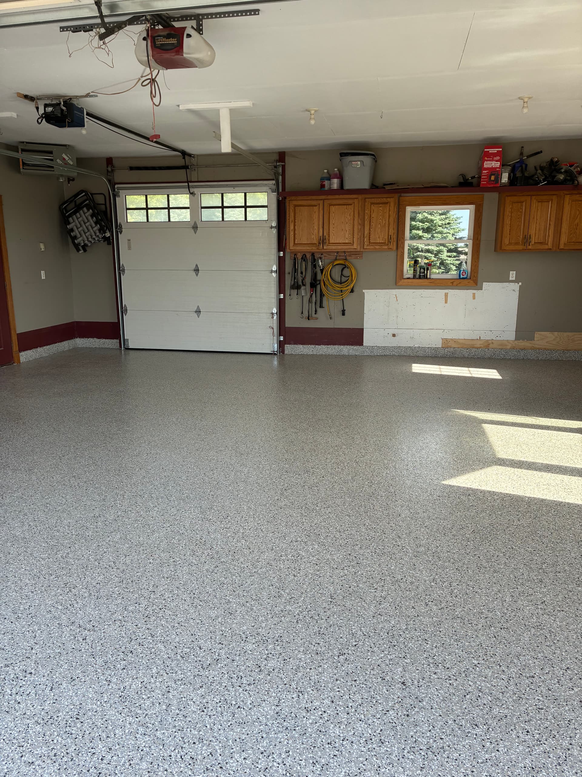 New Concrete Driveway and Epoxy Garage Floor Done Right