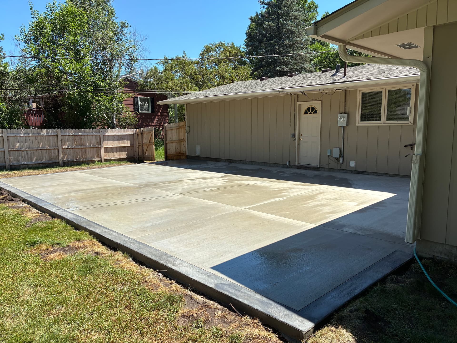 Concrete Patio with a Colored Border That Actually Finishes the Space image